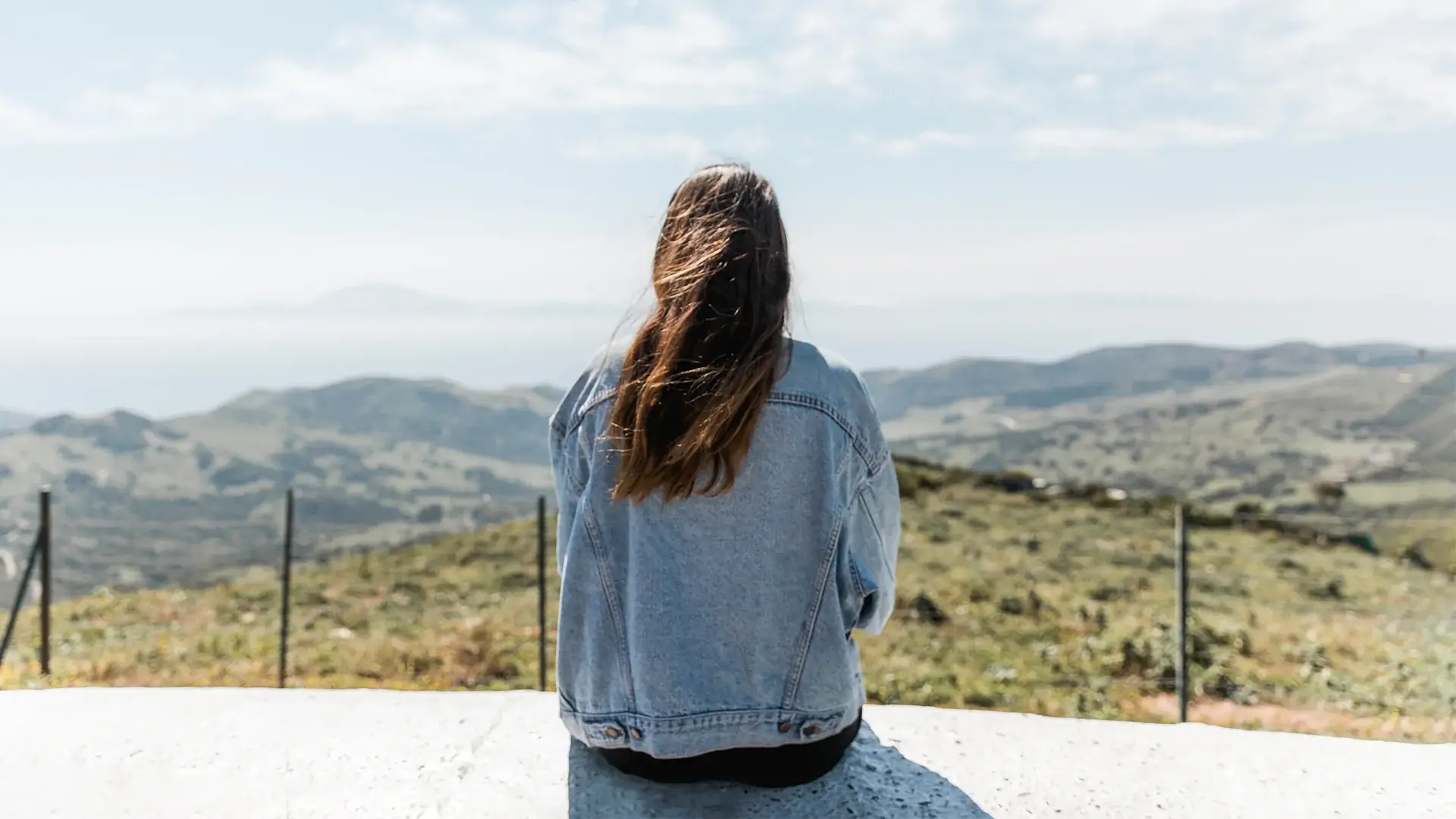 woman enjoying view mountains