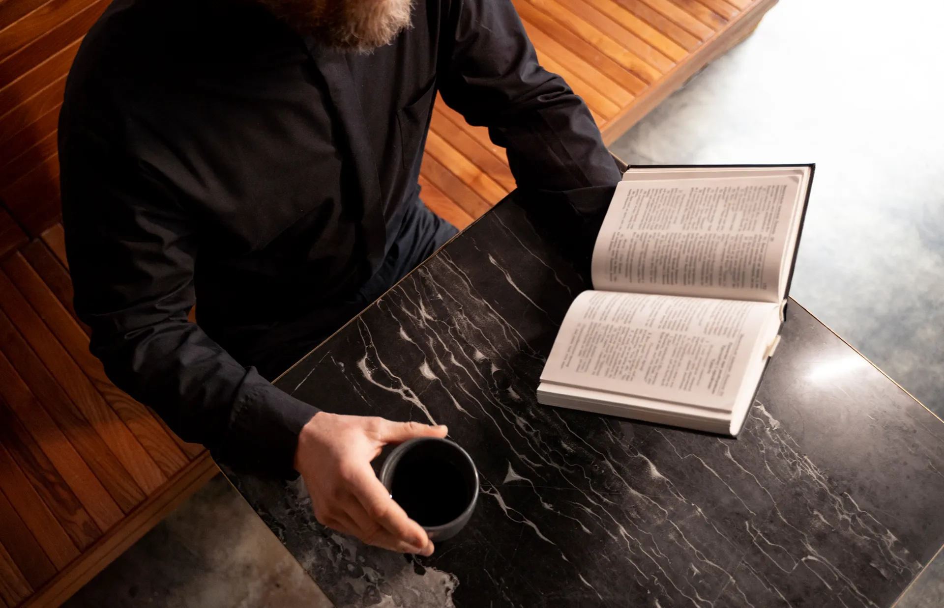 Close up on priest reading form the bible