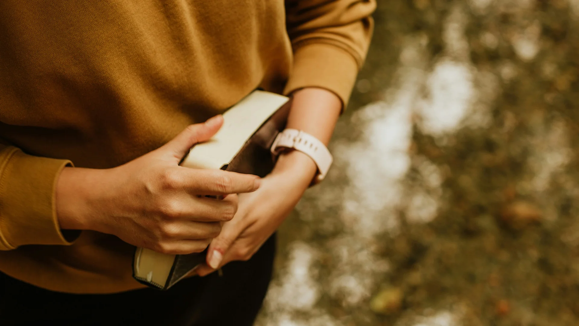 Woman Holding a Bible